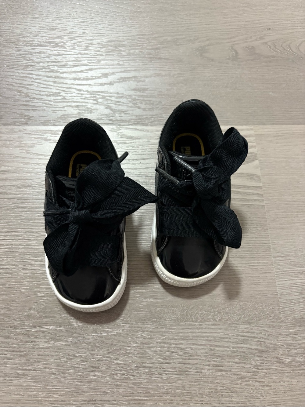 Puma Kids Black Patent Sneakers with White Sole and Bow